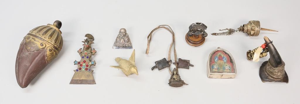 Appraisal: Two temple toys one brass bird one silver tone elephant