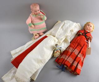 Appraisal: A th century doll with composition head open brown eyes