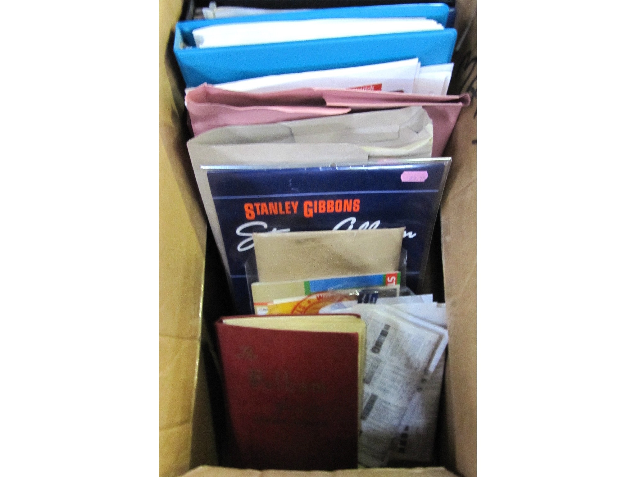 Appraisal: A box of albums of stamps and magazines on stamps