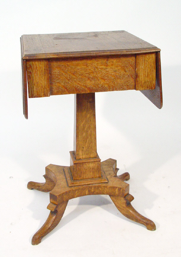 Appraisal: th century oak dropleaf occasional table fitted with a frieze