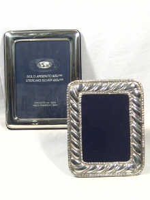 Appraisal: A modern silver picture frame with rounded corners measurements cm