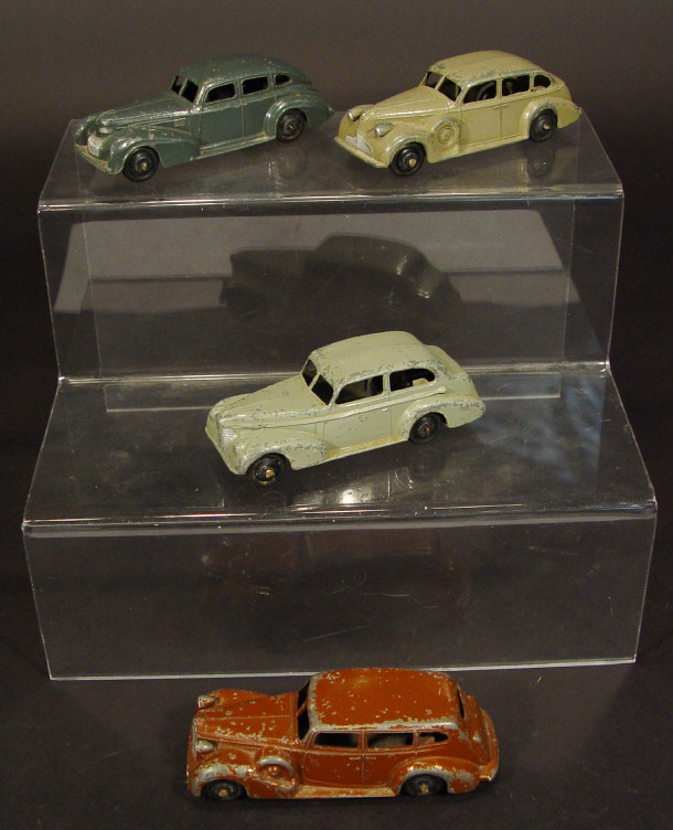 Appraisal: Four Dinky Toys die-cast American saloon cars comprising an Oldsmobile