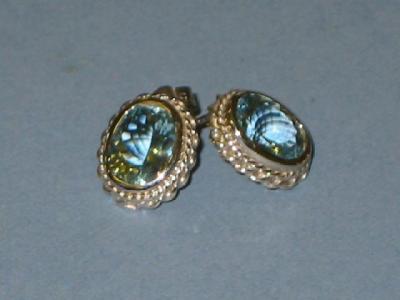 Appraisal: A PAIR OF AQUAMARINE EAR STUDS the oval cut stones