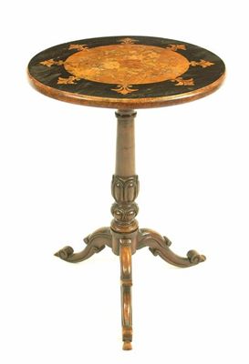 Appraisal: A Victorian walnut ebonised and floral marquetry tripod table in