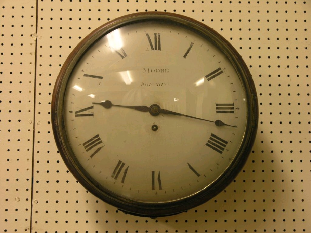 Appraisal: A mid th century dial clock by Moore of Worthing