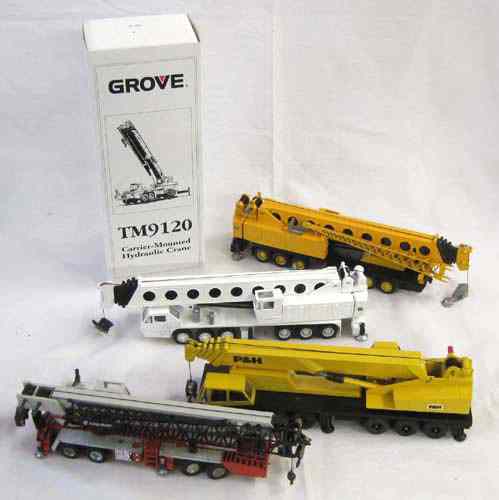 Appraisal: FIVE DIECAST METAL SCALE MODELS OF MOBILE CRANES including NZG