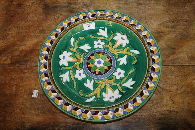 Appraisal: A MAJOLICA GREEN GROUND CIRCULAR PLATTER with geometric border cm