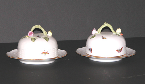 Appraisal: Pair of Herend Porcelain Butter Dishes decorated with birds insects