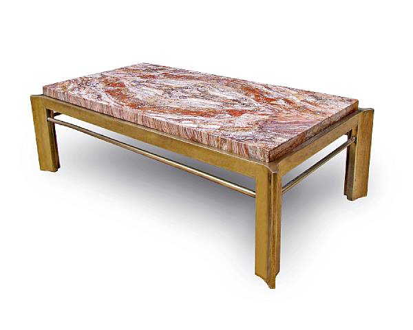 Appraisal: An Italian Baroque red travertine and brass-plated steel low table