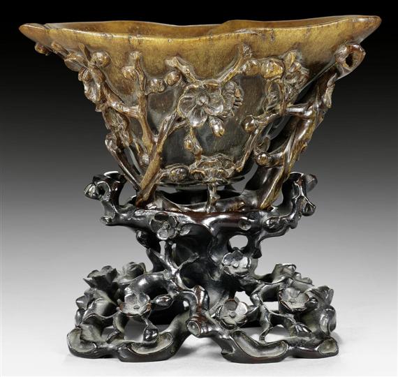 Appraisal: A FINE RHINOCEROS-CUP CARVED WITH PLUM BLOSSOMS China th th