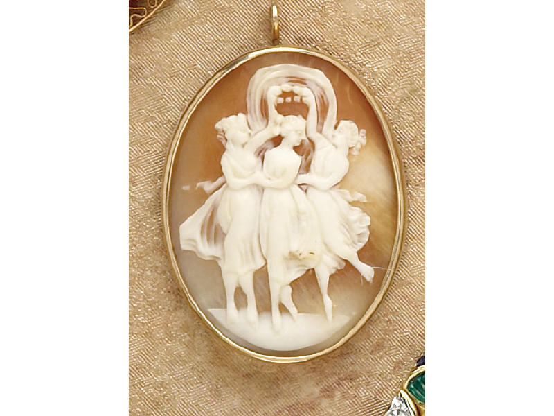 Appraisal: CAMEO PENDANT Three sisters cameo in gold frame measuring th