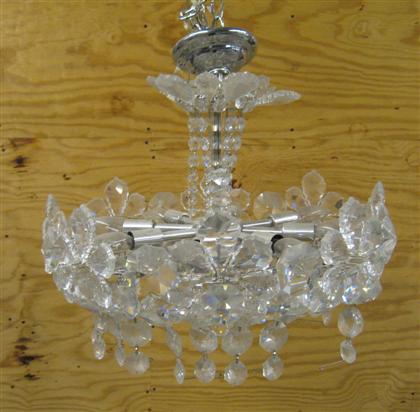 Appraisal: Metal and glass chandelier th century The circular ring hung