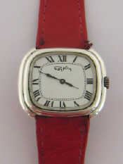 Appraisal: ROY KING a silver mid-size manual wind wristwatch the oblong