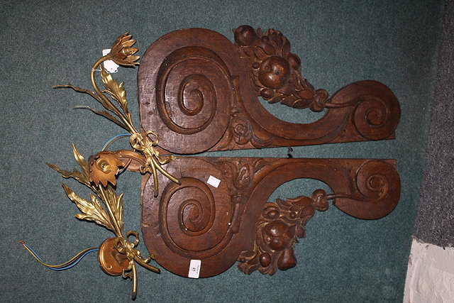 Appraisal: A PAIR OF CARVED OAK BRACKETS and a pair of