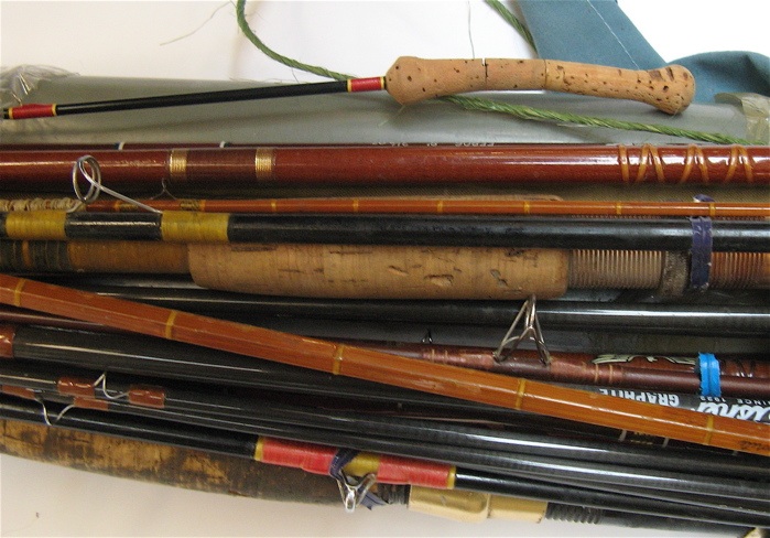 Appraisal: COLLECTION OF APPROXIMATELY TWELVE FISHING POLES some bamboo graphite and