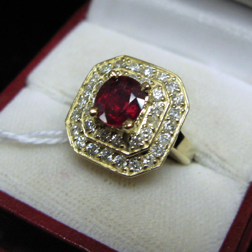 Appraisal: RUBY DIAMOND AND FOURTEEN KARAT GOLD RING The ring has