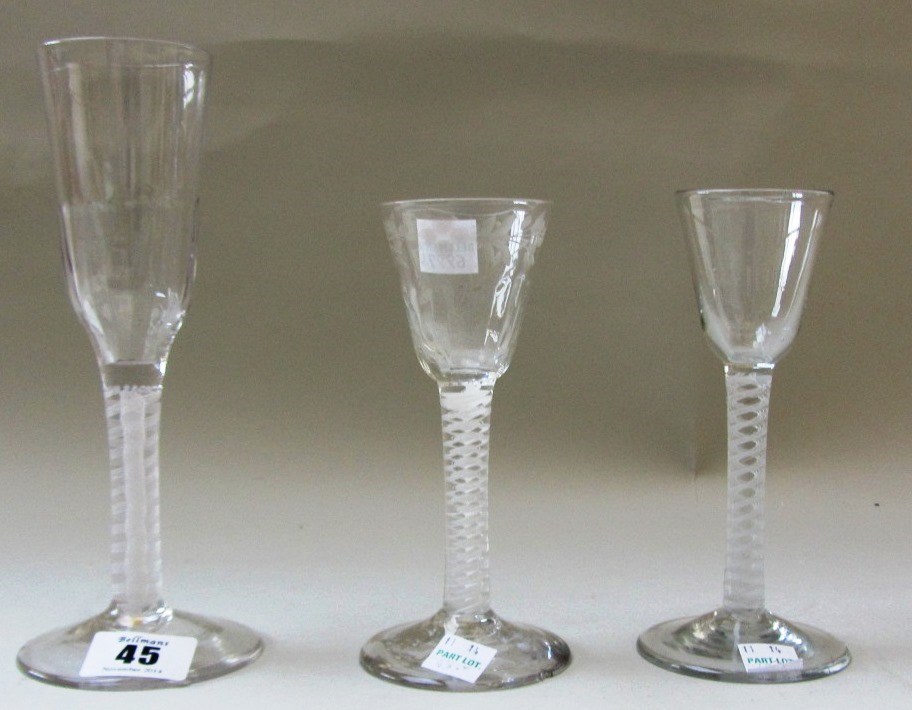 Appraisal: Three opaque twist glasses circa comprising an ale glass with