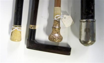 Appraisal: Four Victorian walking sticksVarious forms