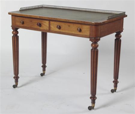 Appraisal: A Regency walnut writing table the top with giltmetal balustraded