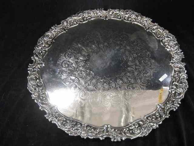 Appraisal: English Silverplate Round Serving Tray engraved floral with elaborate border