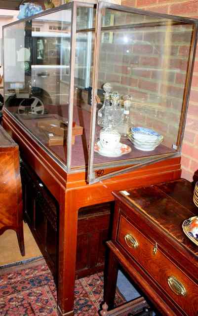 Appraisal: A MAHOGANY FLOOR STANDING MUSEUM DISPLAY CASE the brass mounted