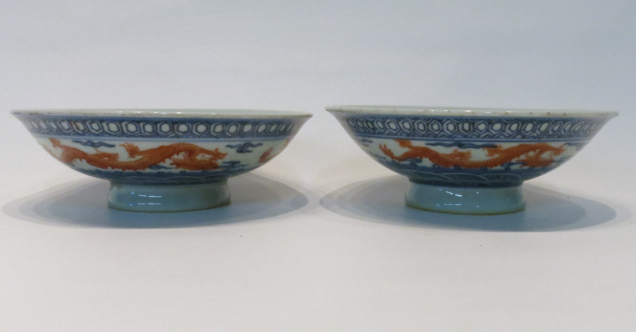 Appraisal: TWO CHINESE PORCELAIN BOWLS decorated with five-toed dragons to the