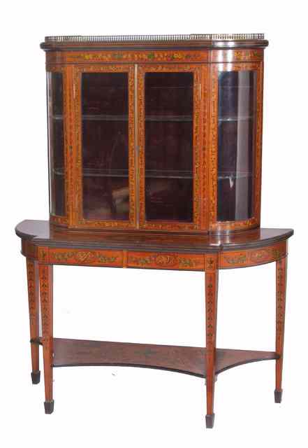 Appraisal: AN EDWARDIAN SATINWOOD DISPLAY CABINET the upper part with a