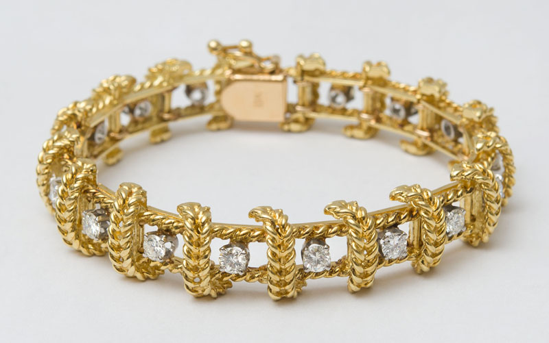 Appraisal: K GOLD AND DIAMOND BRACELET Set with full cut diamonds