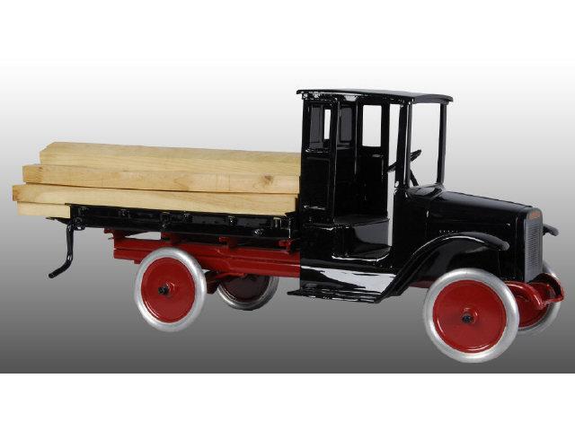 Appraisal: Pressed Steel Buddy L Lumber Truck with Lumber Description Circa