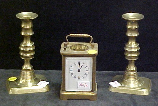 Appraisal: Pair of th C brass push up candlesticks '' h