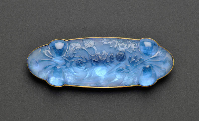 Appraisal: Molded Blue Glass Brooch Lalique depicting thistle motifs on a