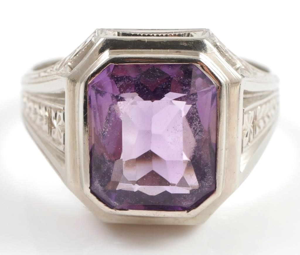 Appraisal: K white gold ring contains one emerald cut amethyst Weight