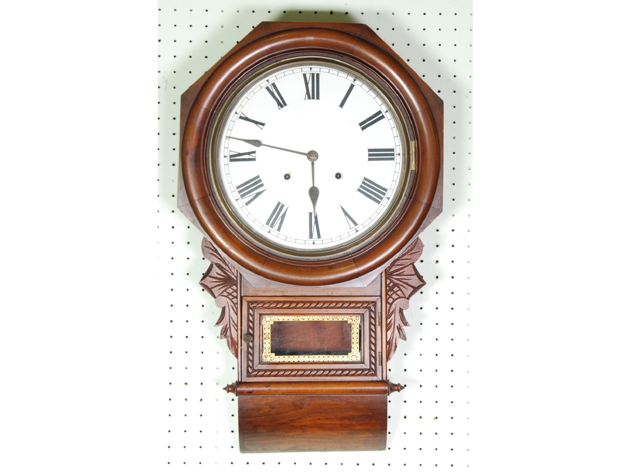 Appraisal: VICTORIAN CARVED WALNUTWOOD CASED DROP DIAL WALL CLOCK the enamelled