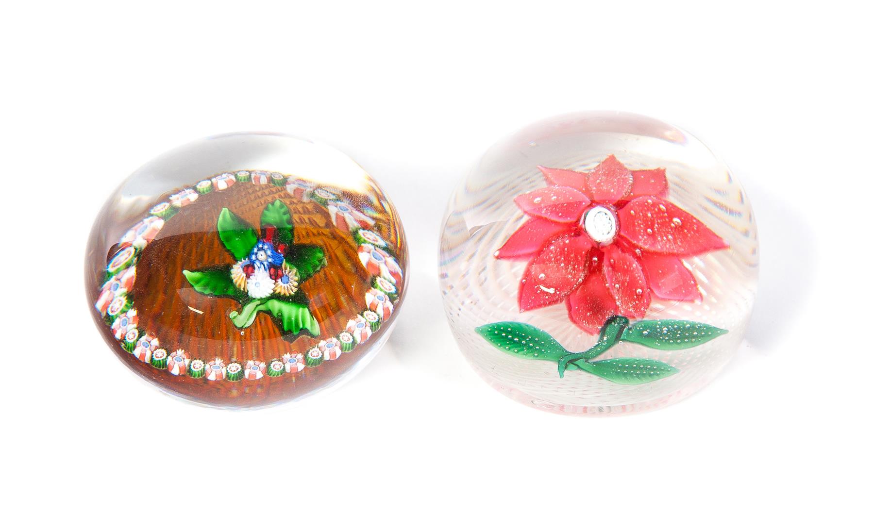 Appraisal: TWO PAPERWEIGHTS Late th century A poinsettia on a swirled