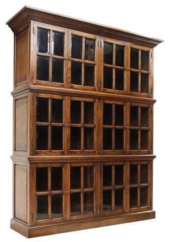 Appraisal: Oak bookcase th c having cornice top over three stacked