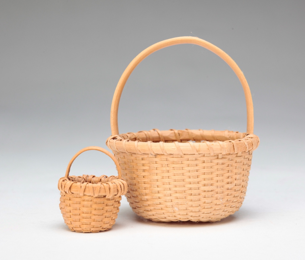 Appraisal: TWO CONTEMPORARY MINIATURE BASKETS Made by Hugh and Elizabeth Wilson