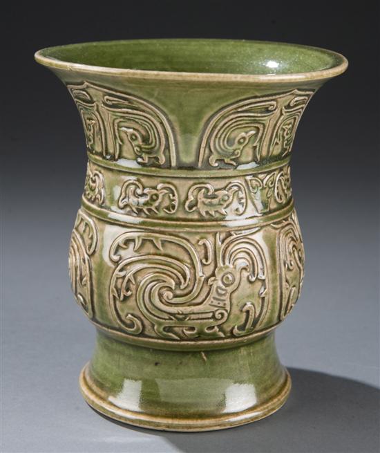 Appraisal: Chinese green glazed spittoon Having a flared top and bottom