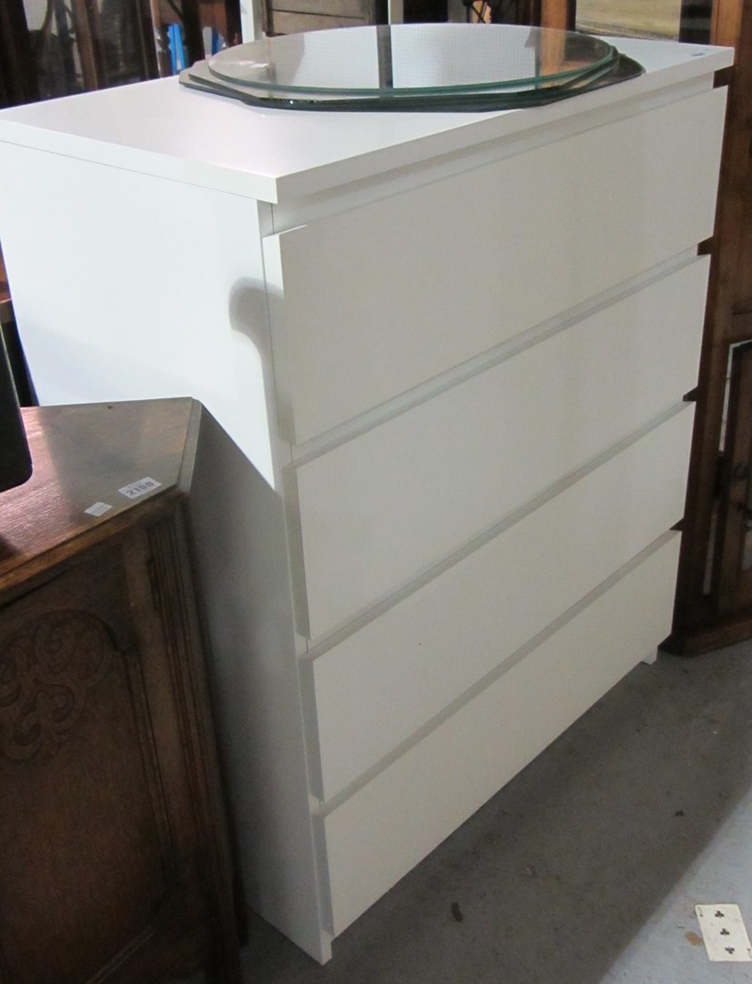 Appraisal: A white four-drawer chest of drawers and a full length