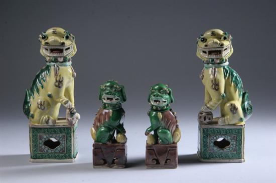 Appraisal: FOUR CHINESE SANCAI FIGURES OF FU-LIONS Qing dynasty Each on