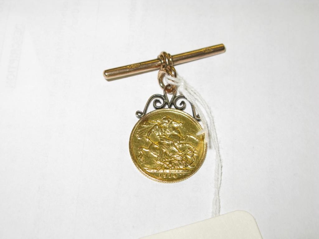 Appraisal: A gold sovereign with pendant mount and a ct gold