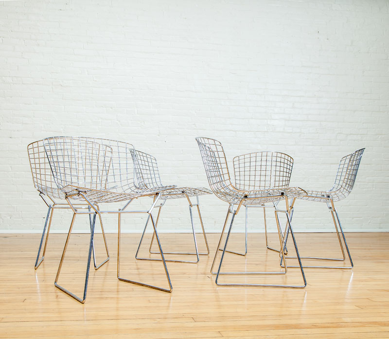 Appraisal: SIX CHROME BERTOIA SIDE CHAIRS FOR KNOLL With full cushions