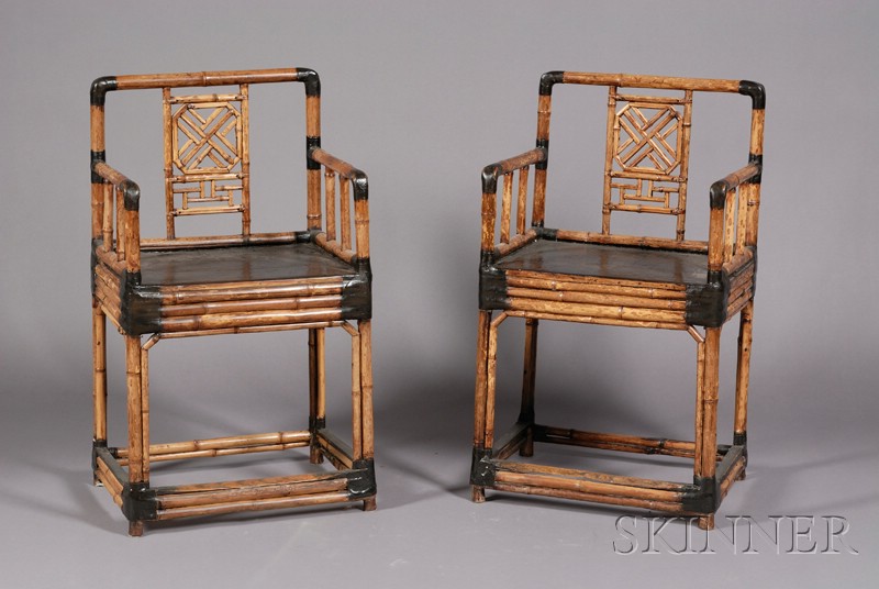 Appraisal: Pair of Armchairs China th century bamboo with black lacquered