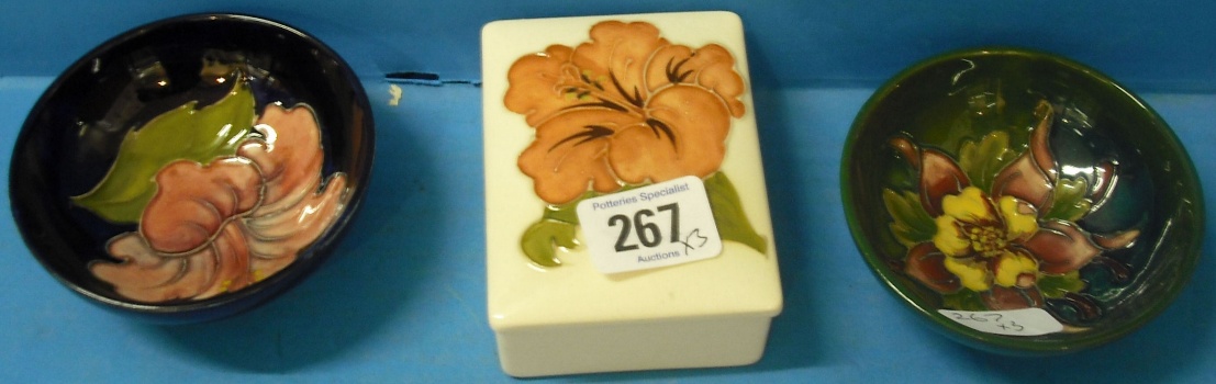 Appraisal: Moorcroft Box and Cover decorated with Hibiscus on cream ground