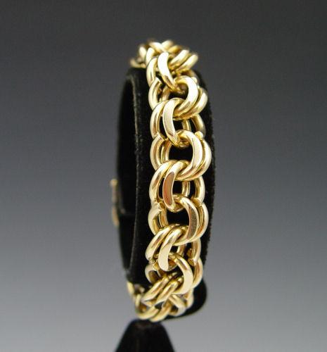 Appraisal: CARTIER K LINK BRACELET K yellow gold double circle charm