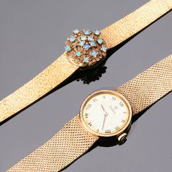 Appraisal: A collection of two ladies k gold wristwatches featuring a