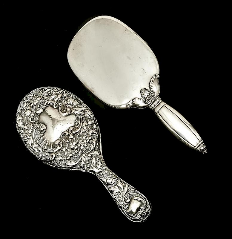 Appraisal: Sterling hand mirrors Sterling hand mirrors one in repousse floral