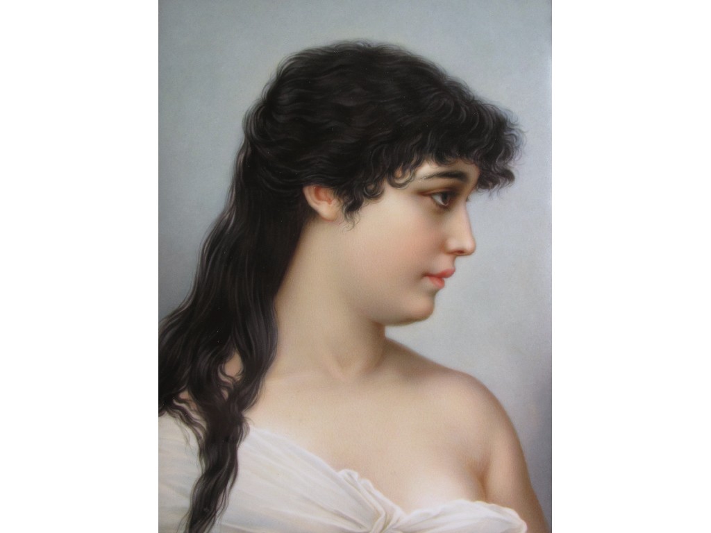 Appraisal: A German porcelain rectangular plaque painted with a young woman