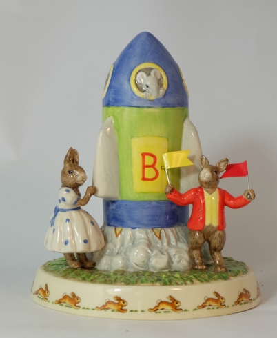 Appraisal: Royal Doulton Bunnykins Moneybox Tableau figure Shooting for the stars