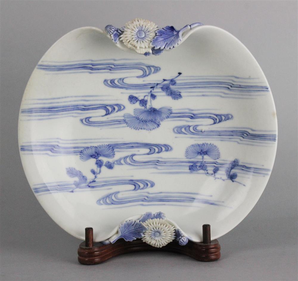 Appraisal: JAPANESE HIRADO BLUE AND WHITE SHAPED DISH WITH APPLIED KIKU