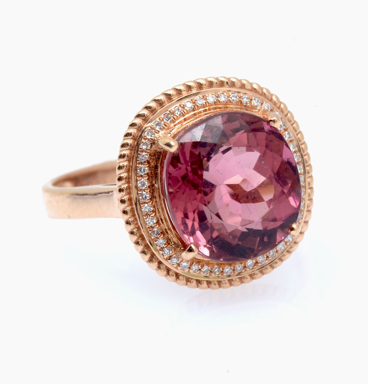 Appraisal: K TOURMALINE DIAMOND RING K yellow gold ring contains one